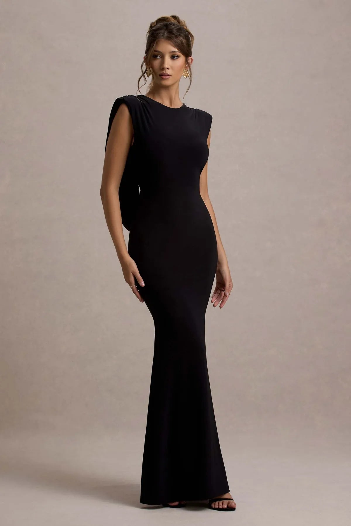 Sophisticated Black Mermaid -Style Prom Gown with Unique Shoulder Detail and Figure  Hugging Fit for Glamorous Evenings