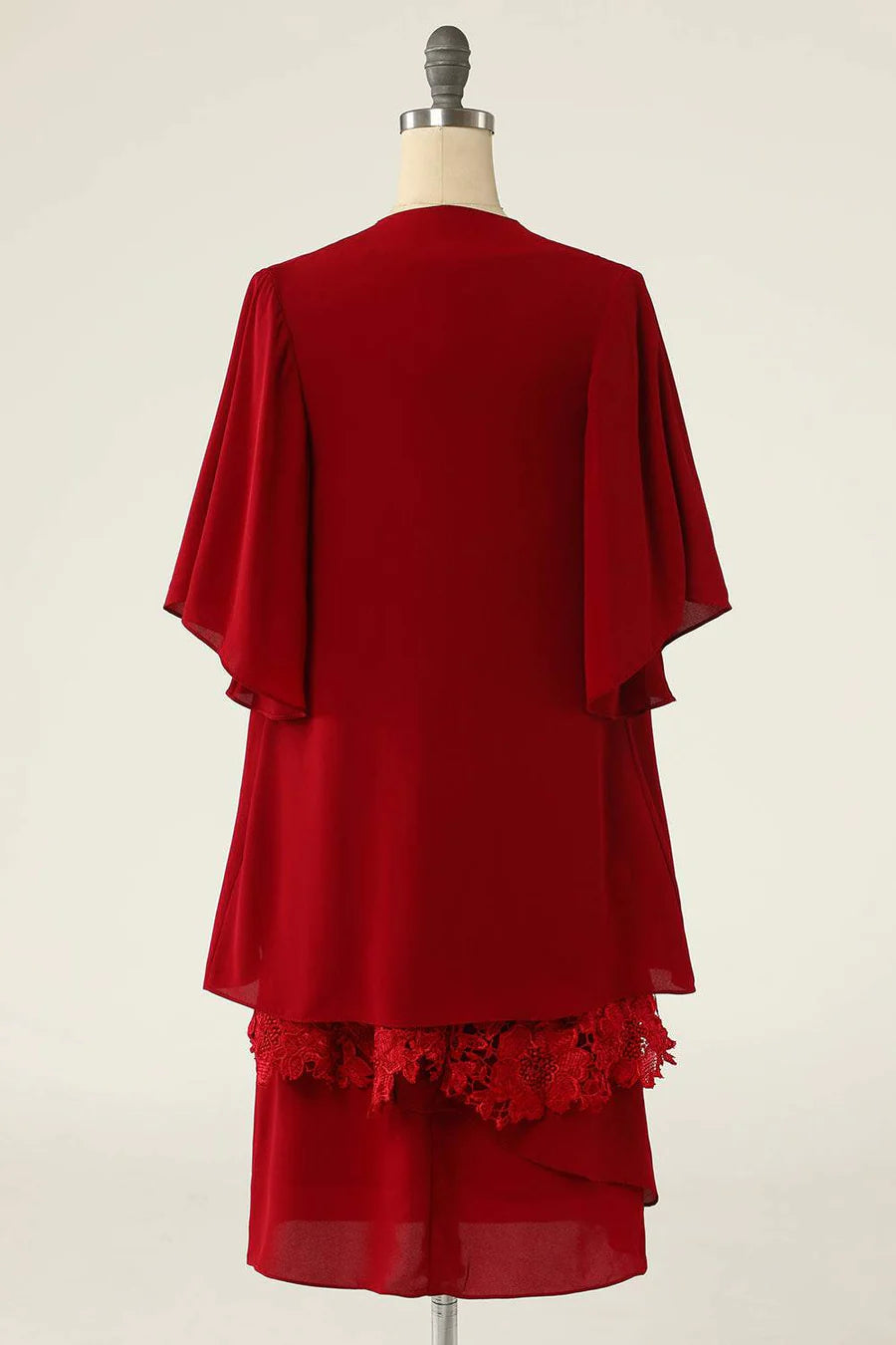 Two piece red lace short bridal gown paired with a button up cardigan wool sweater