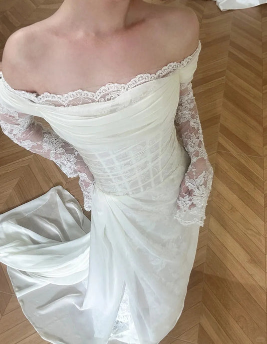 Vintage Inspired Off - Shoulder Wedding Dress with Sheer Lace Sleeves Satin Drape Detailing Corset Style