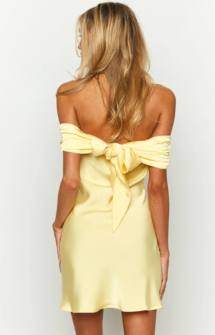Yellow Satin Homecoming Dress with Off-Shoulder Neckline and Ruched Accent for a Stunning Appearance
