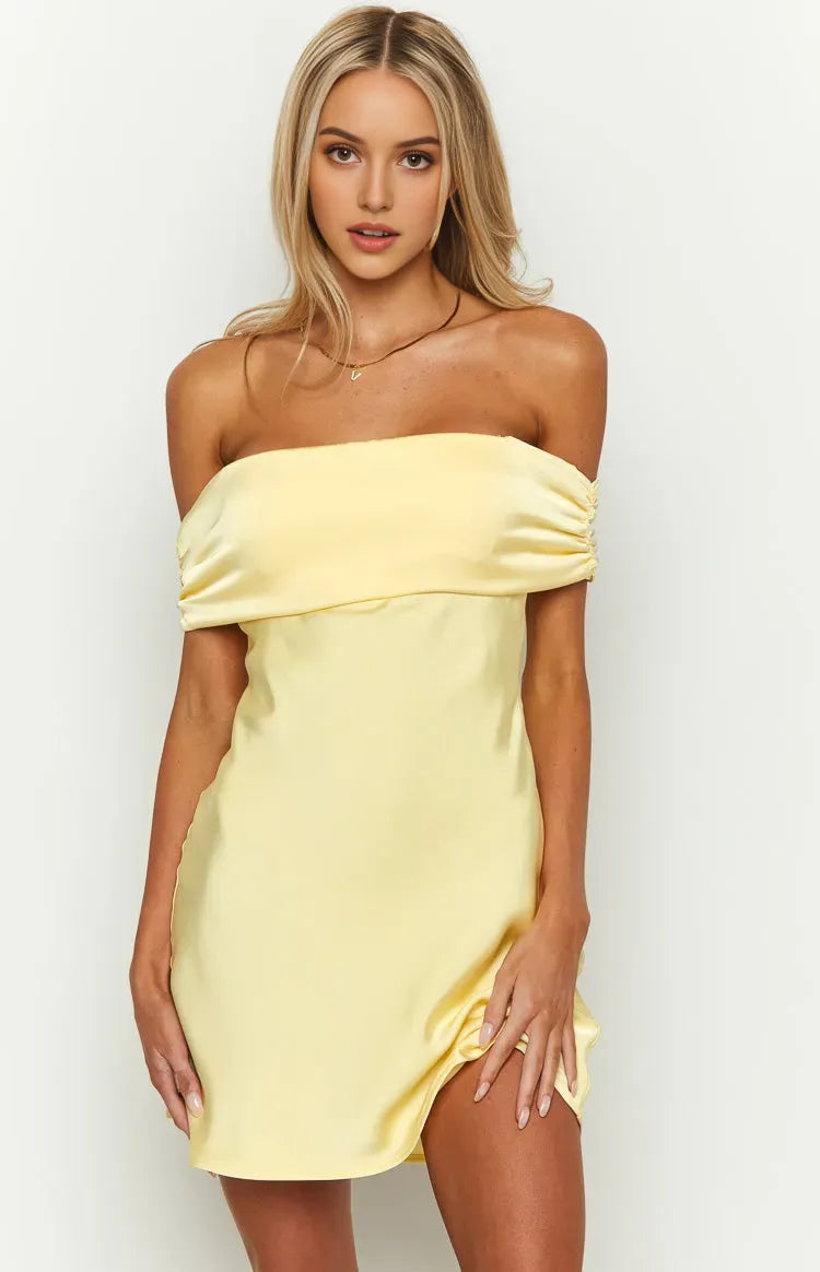 Yellow Satin Homecoming Dress with Off-Shoulder Neckline and Ruched Accent for a Stunning Appearance