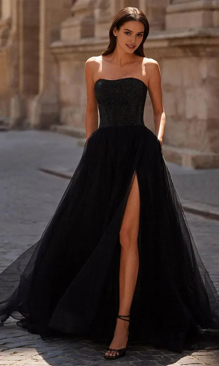 Elegant Black Strapless Prom Gown with Beaded Bodice and Tulle Skirt Featuring High Slit