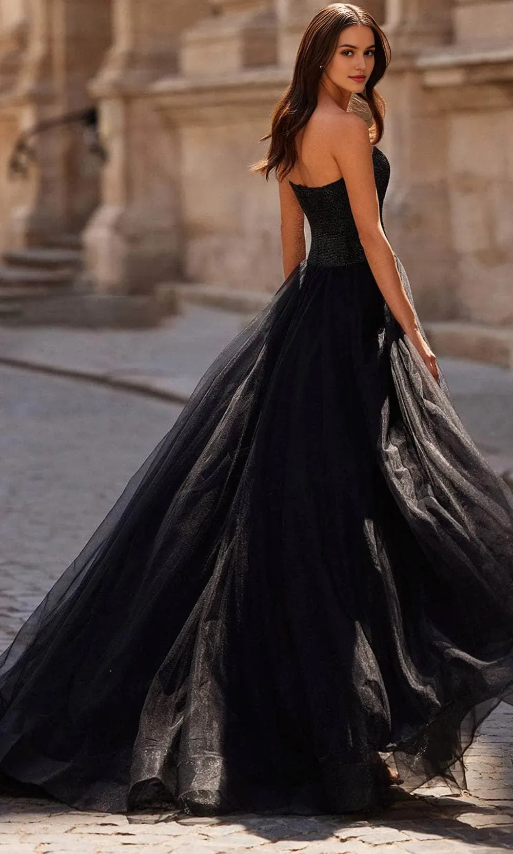 Elegant Black Strapless Prom Gown with Beaded Bodice and Tulle Skirt Featuring High Slit