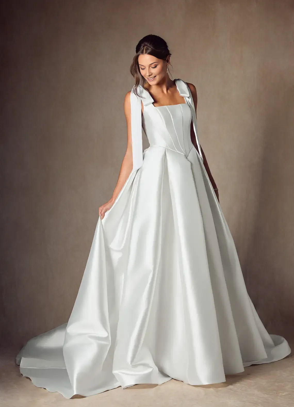 legant Satin Ball Gown Wedding Dress with Square Neckline Bow - Accented Straps and Structured Corset Bodice for Timeless Bridal Glamour