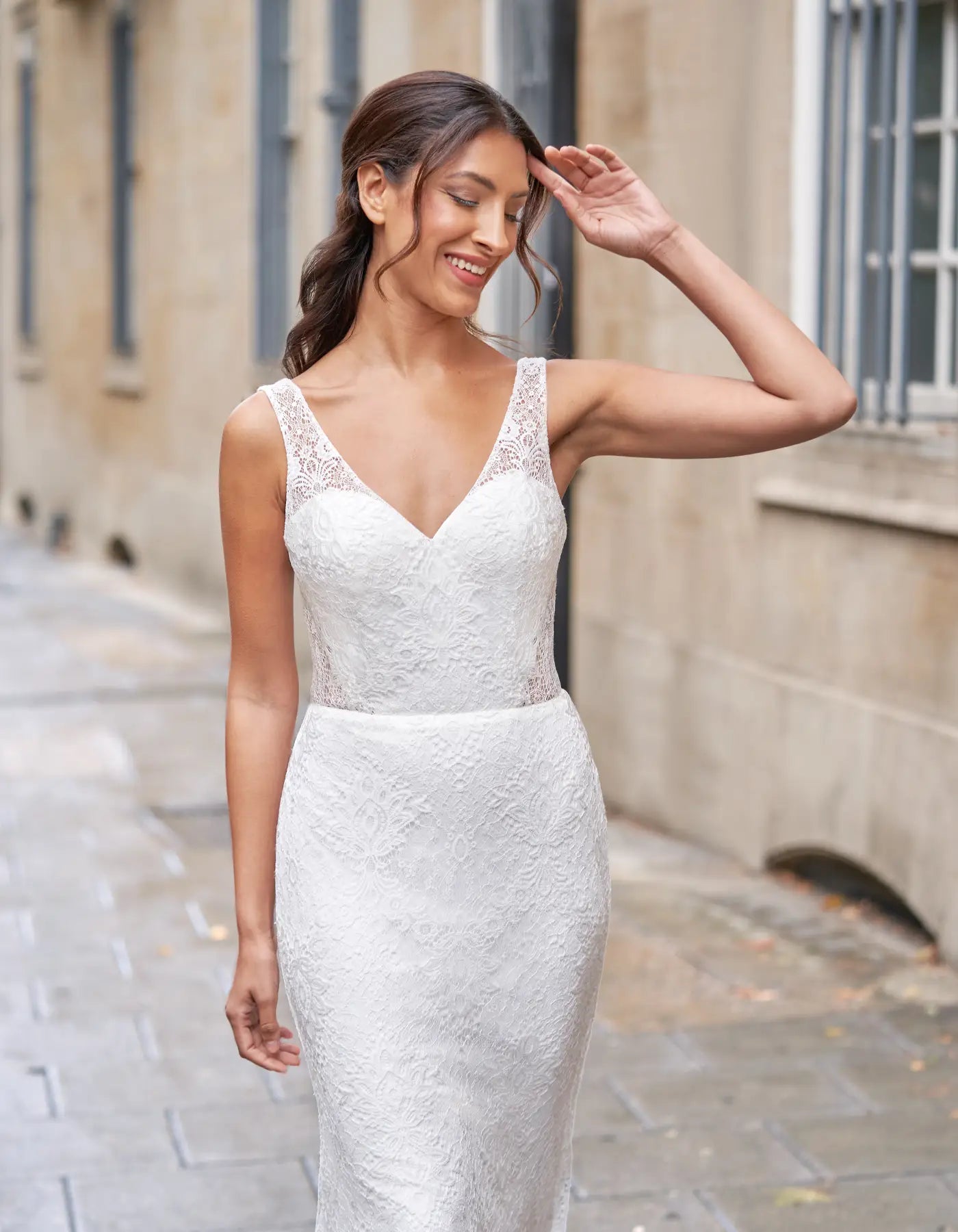 DingJiDress an all-over lace sheath gown
